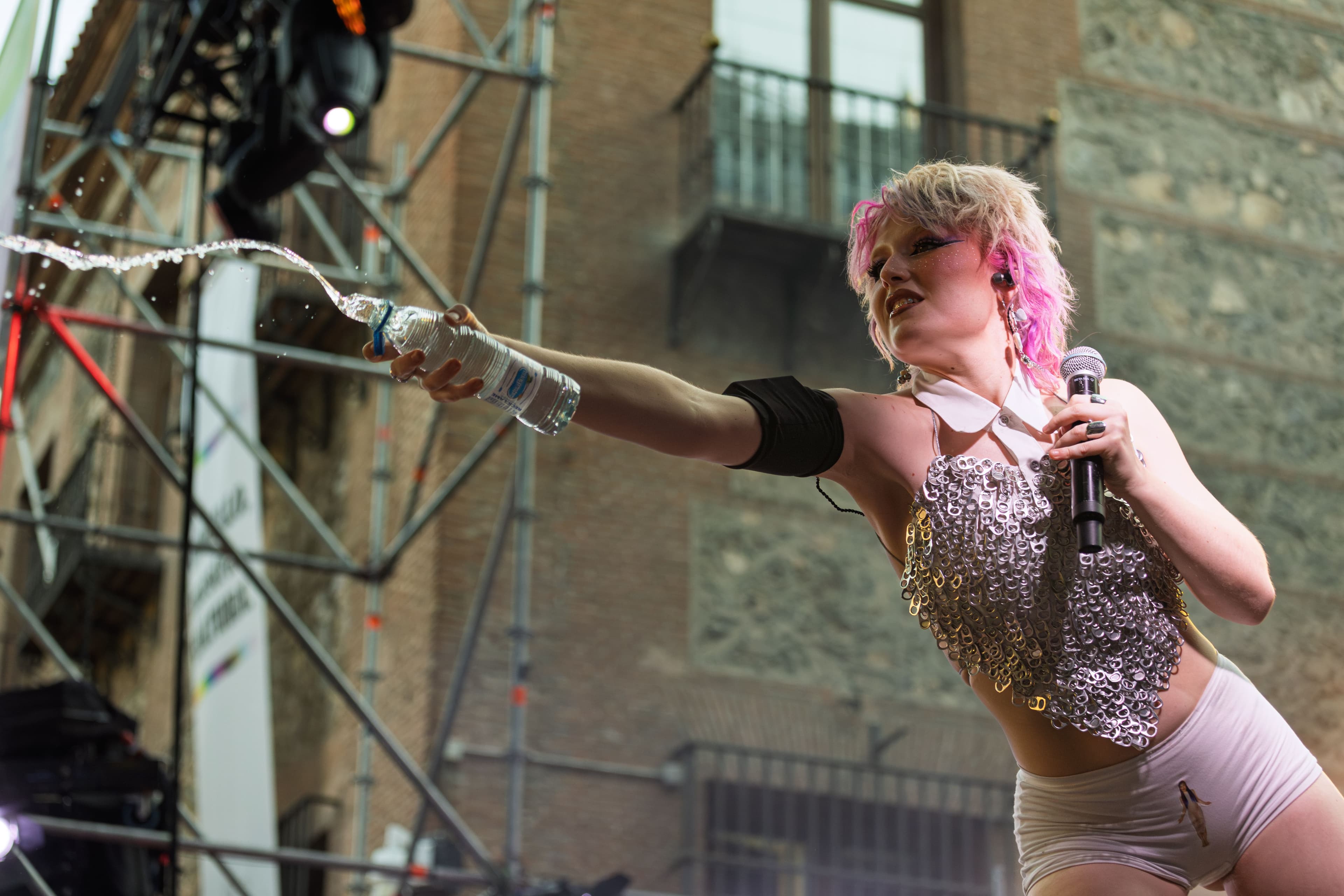 A performer appears on a stage during Madrid Pride in 2025.