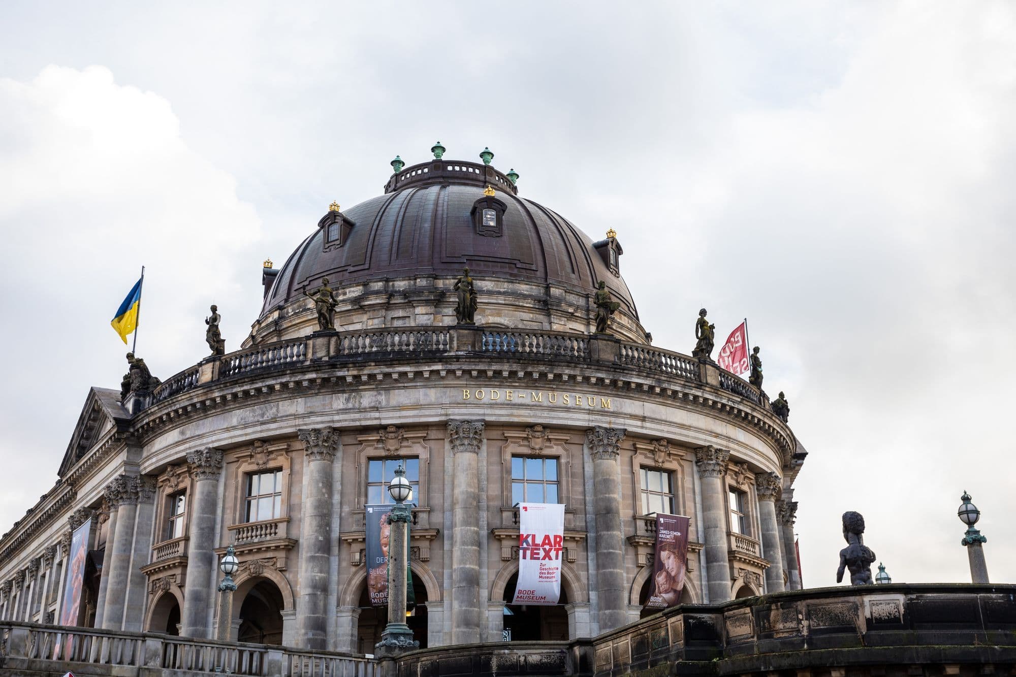 The stone exterior and dome of Berlin's Bode Museum viewed from below.
