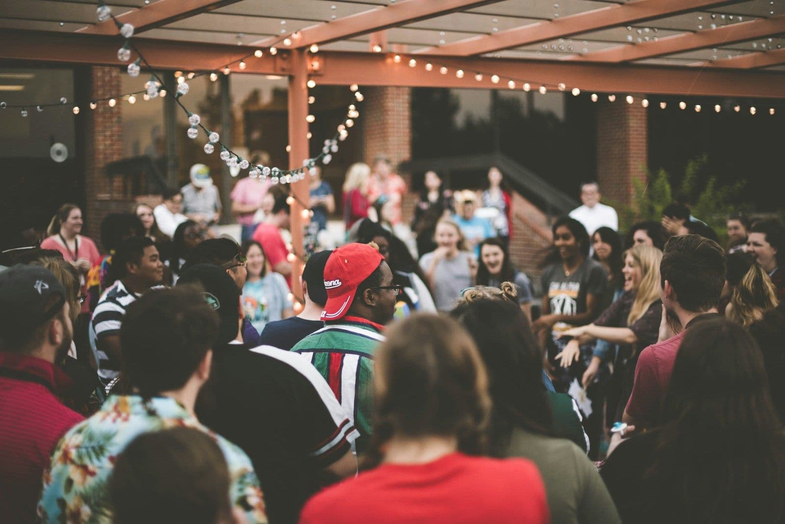 People gathered at an evening cultural event