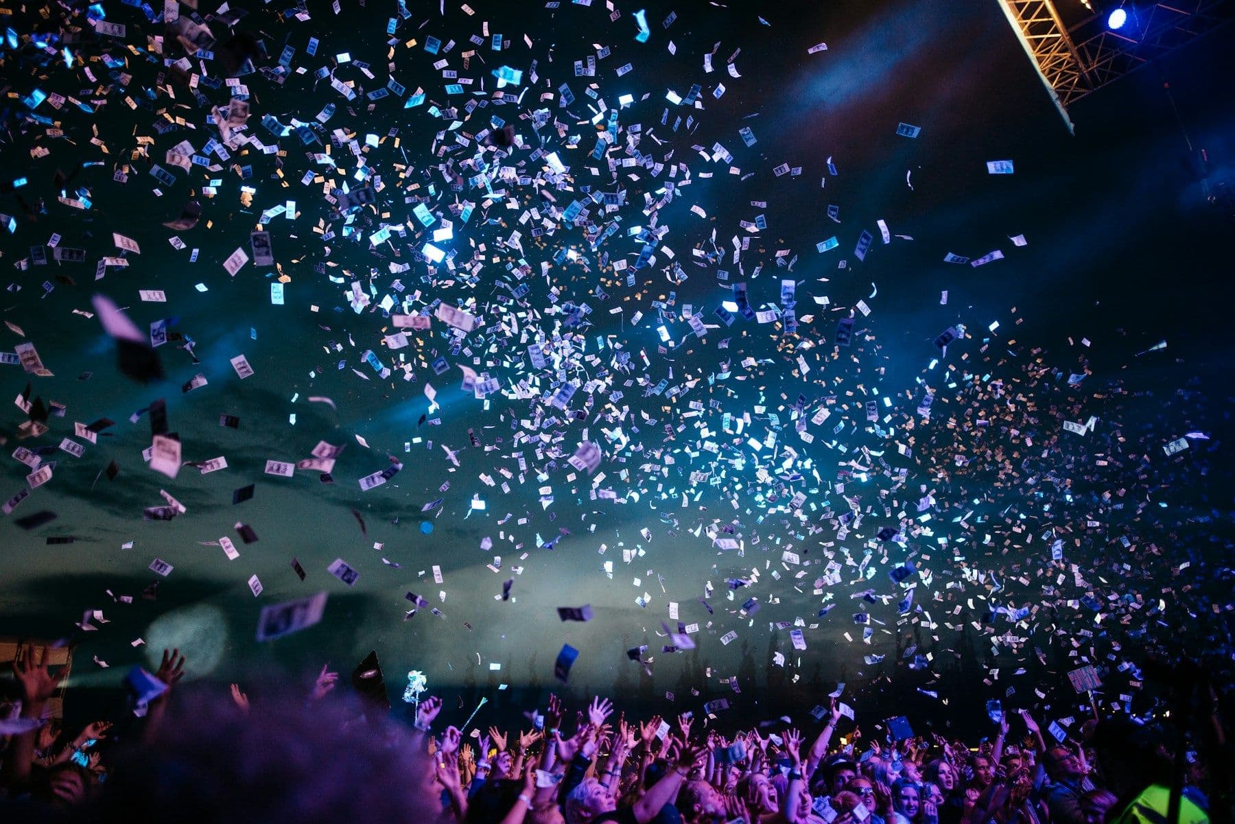 Crowd at a colorful outdoor celebration