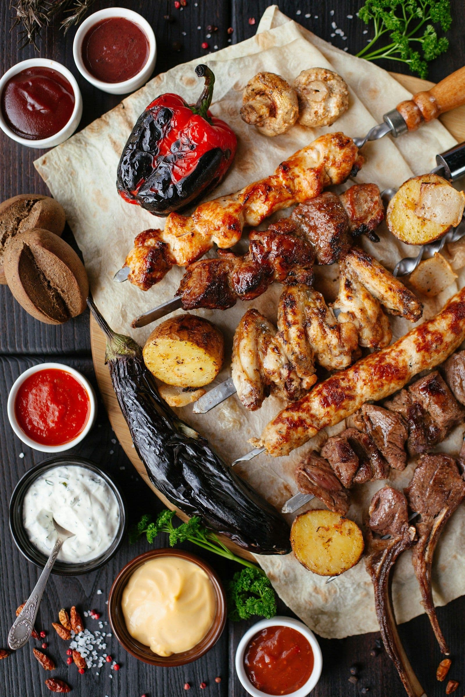 Tacos al pastor being prepared on a vertical spit